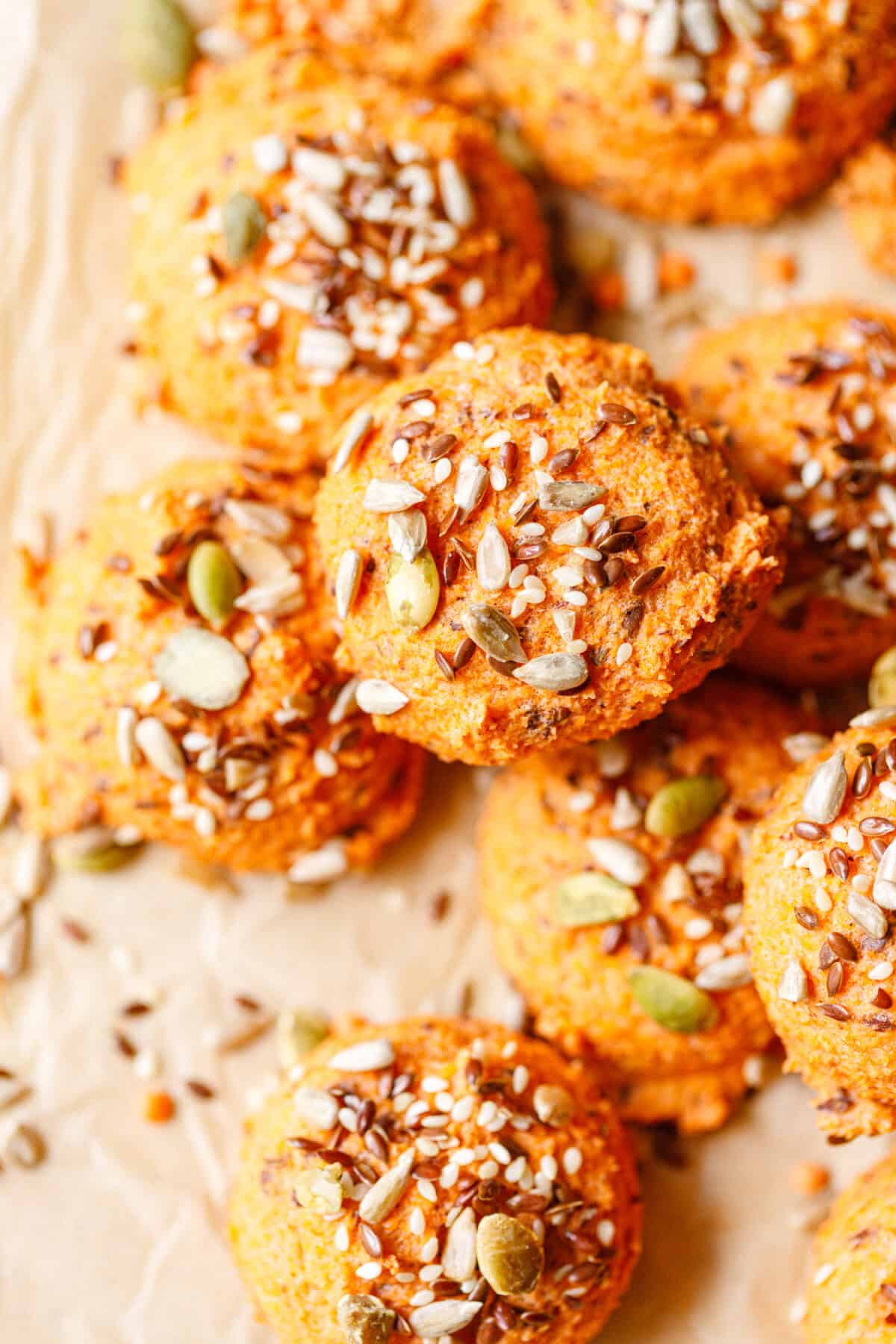 Close-up of no yeast bread rolls made with red lentils, topped with mixed seeds