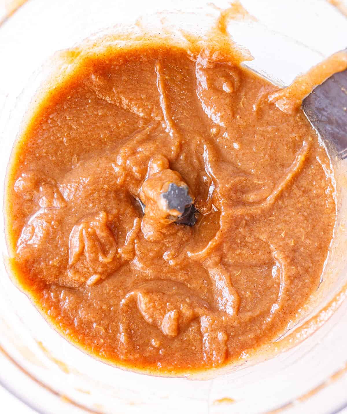 Close-up of smooth homemade cinnamon applesauce in a blender