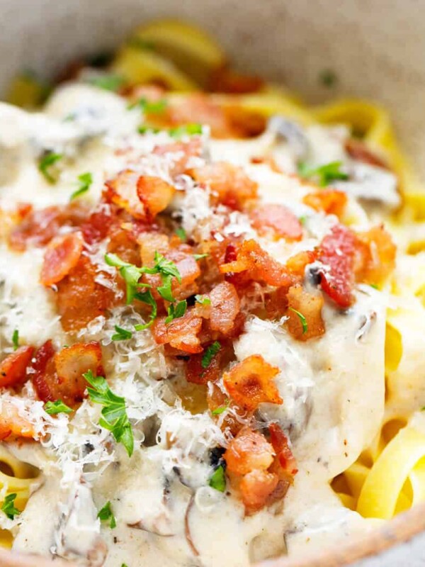 Tagliatelle with bacon and mushrooms in a bowl
