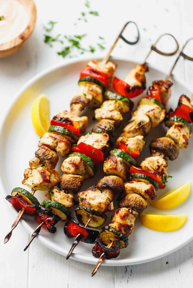 Chicken Kabobs With Mushrooms, Zucchini And Peppers and lemon slices