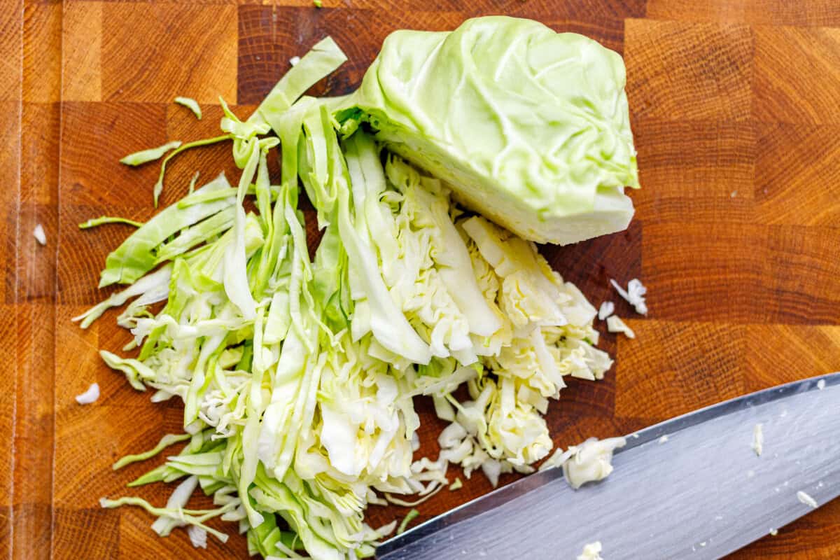 Chopped purple cabbage prepared for salad, adding vibrant color and crunch to a fresh cabbage slaw.