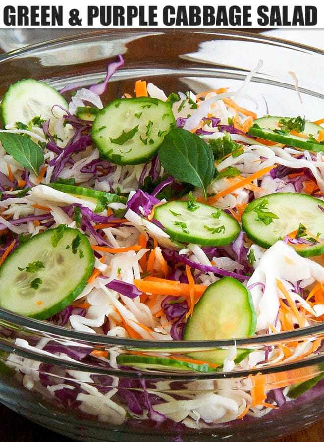 Red and green cabbage salad in a clear bowl