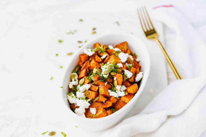 Roasted sweet potatoes with feta in a bowl