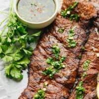 Grilled skirt steak topped with Chimichurri sauce