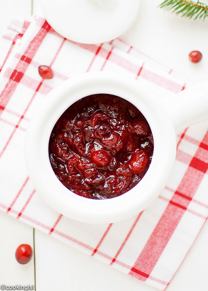 A ceramic dish filled with Easy Homemade Cranberry Sauce