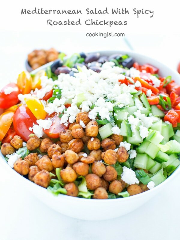 Mediterranean style lettuce salad made with cherry tomatoes, cucumbers, roasted red peppers, Kalamata Olives, Feta and crunchy roasted chickpeas