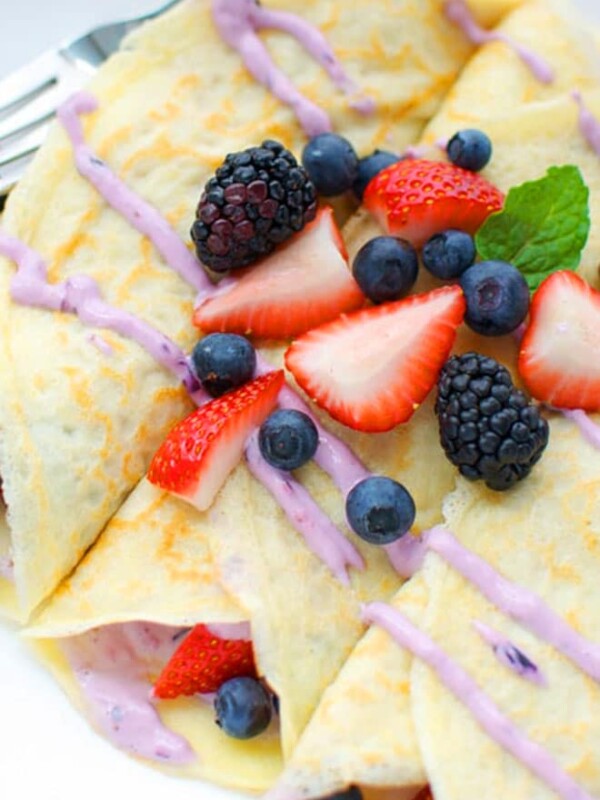 berry cheesecake crepes on a plate