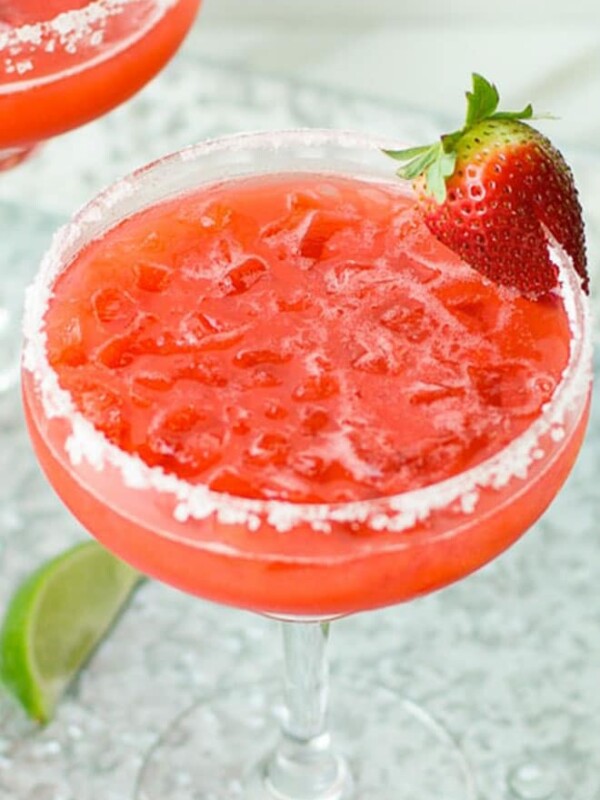 Strawberry margarita in a margarita glass with salt