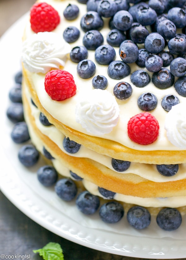 Yellow Cake with Bavarian Cream and blueberries on a platter