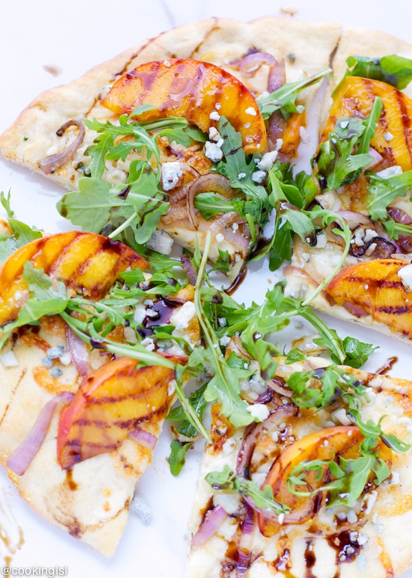 Grilled peach arugula and blue cheese pizza