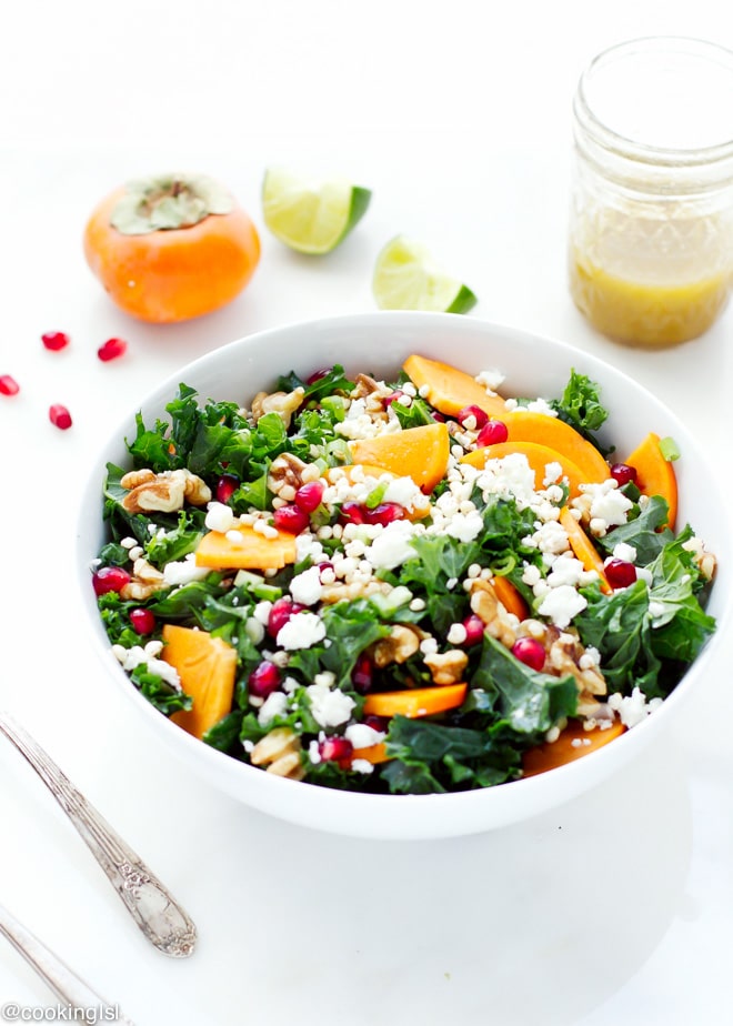 Kale persimmon salad with feta walnuts puffed millet salad lime dressing. 