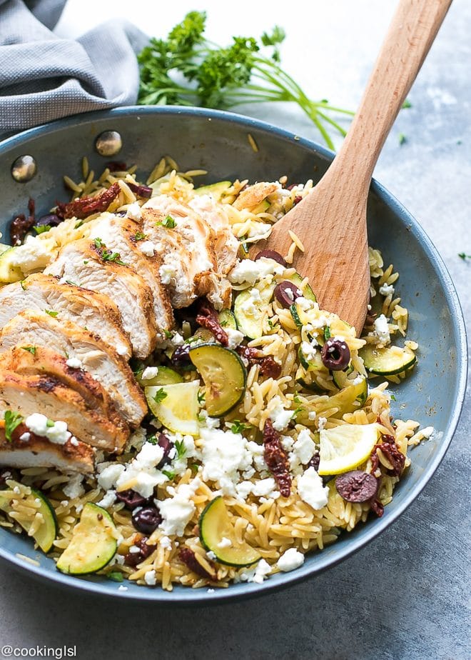 Orzo With Zucchini, Sun Dried Tomatoes and chicken, topped with feta and olives family dinner