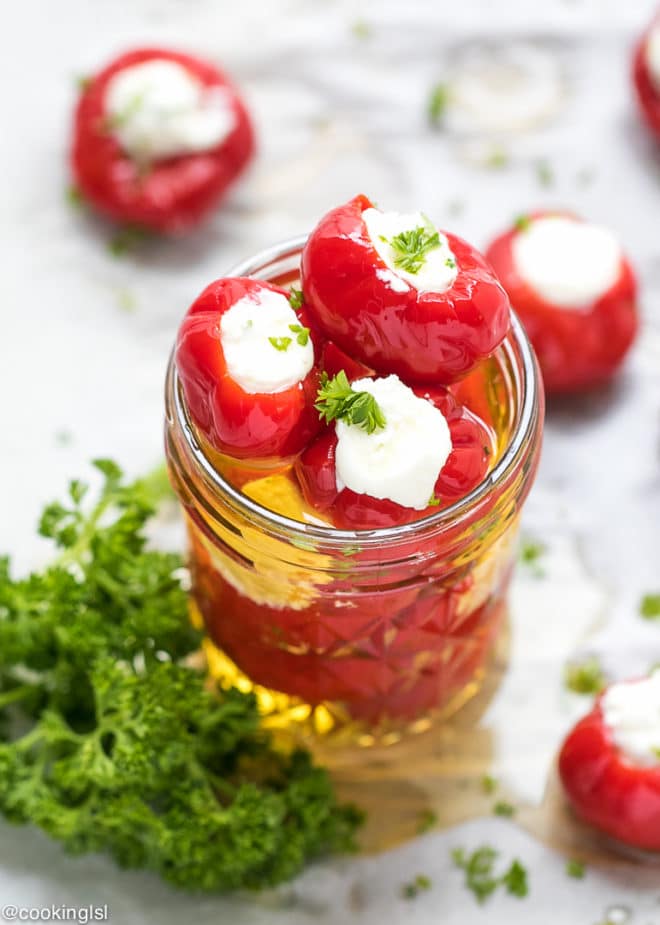 Feta Garlic and Cream Cheese Spread Stuffed Cherry Peppers In A Jar, great for a party appetizer.