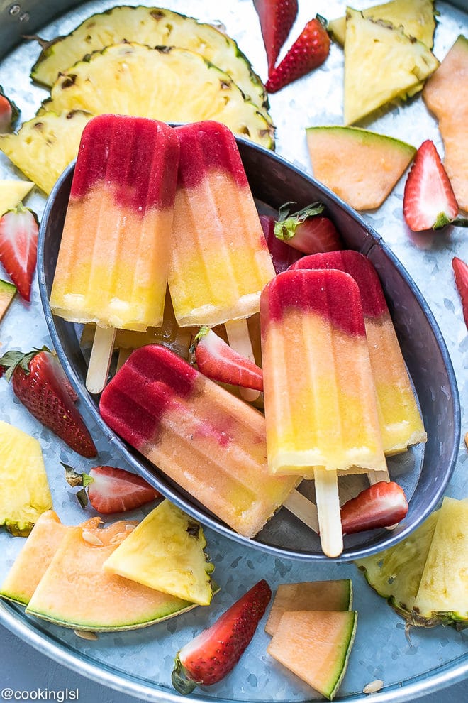 Pineapple-Strawberry-Cantaloupe-Popsicles-fruity-colorful-FUN-and-delicious