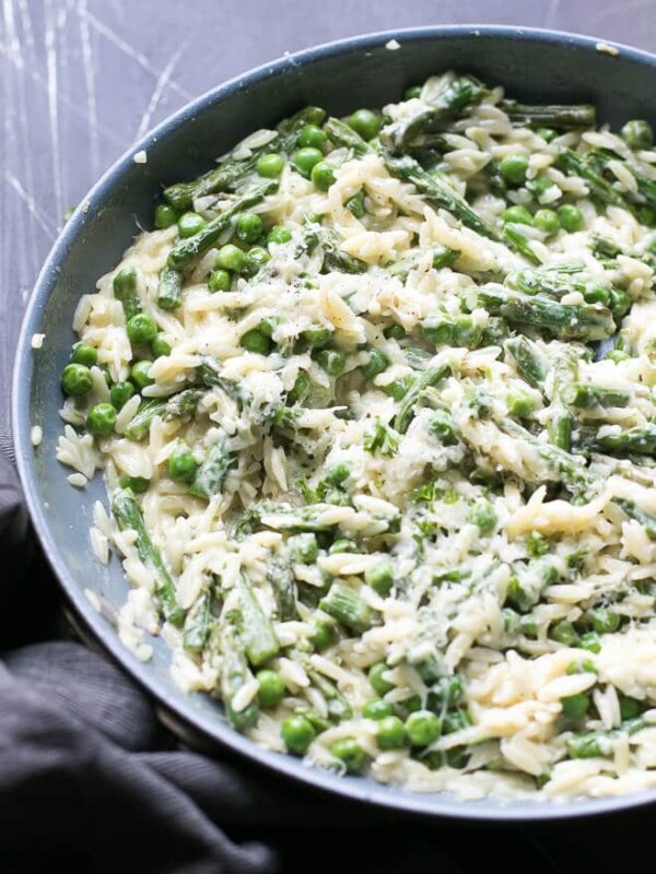 One pan, creamy orzo pasta, made with cream cheese, fresh asparagus, peas, Parmesan, garlic and spices. Weeknight dinner.