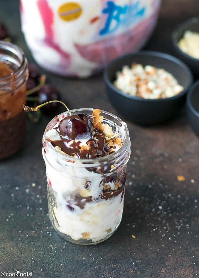 Cherry Sundae Recipe - Blue Bunny® Cherrific Cherry Cheesecake ice cream in a small mason jar, for an after school snack. Topped with rich chocolate sauce.