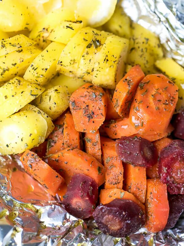 Seasoned with summer savory seasoning, grilled carrots in foil, sliced rainbow carrots to top a salad, grain bowl or for a side dish.