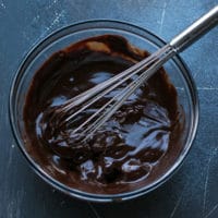Ingredients for Dark Chocolate Pumpkin Pie With Chocolate Crust Recipe. Chocolate ganache glaze with dark chocolate and International Delight® Pumpkin Pie Spice Creamer.