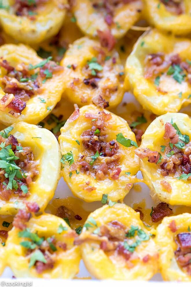 Cheesy Crispy Baked Potato Bites TOPPED WITH PARSLEY, GREAT FOR A PARTY.