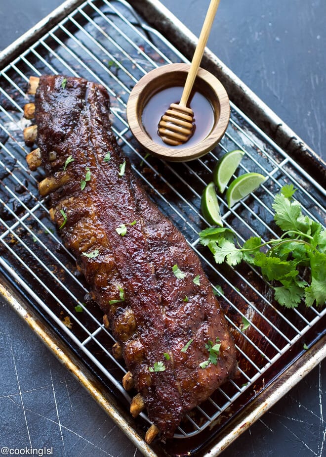 Soy Honey Glazed Pork Ribs Recipe. Smithfield All Natural baby back ribs, on a wire rack, brushed with honey soy sauce.