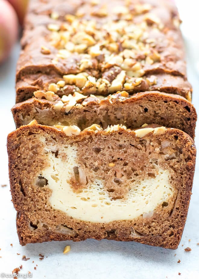 Cream Cheese Filled Apple Bread Recipe -slices of moist apple bread on a cutting board.