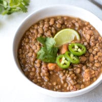 Sweet Potato Lentil Chili Recipe - white bowl of warm and comforting lentil soup.