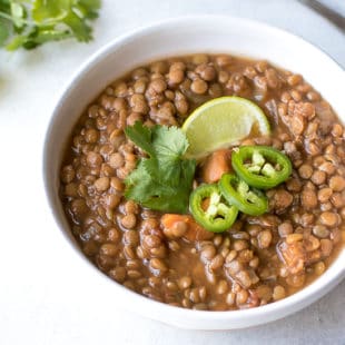 Sweet Potato Lentil Chili Recipe - white bowl of warm and comforting lentil soup.