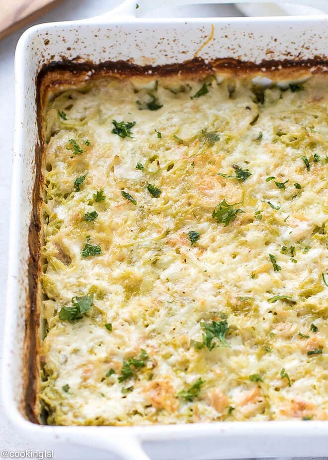 Shaved Brussel Sprouts Gratin With Gruyere Recipe - white baking dish with soft, tender, golden cheesy bake.