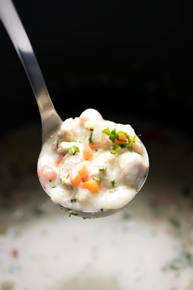 Easy Panera Inspired Easy Cream Of Chicken And Rice Soup in a ladle