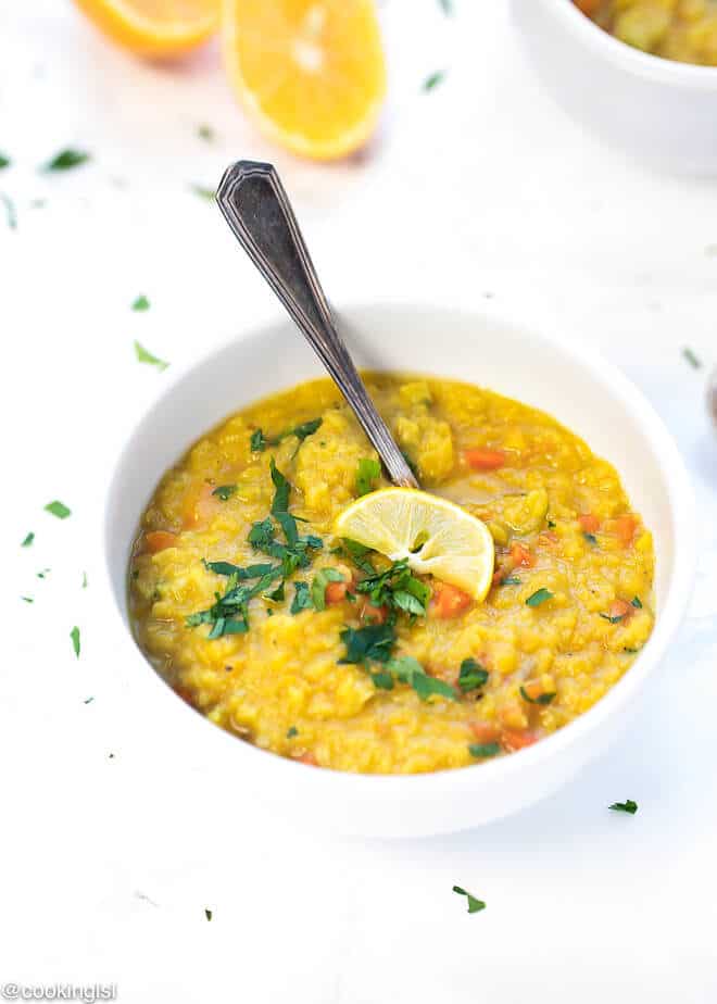 Middle Eastern Lentil Soup Recipe in a bowl, garnished with parsley.