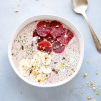 Blood orange smoothie bowl in a bowl, topped with citrus, bananas, hemp seeds, antioxidants, refined sugar free, low calorie, low carb, keto, simple breakfast
