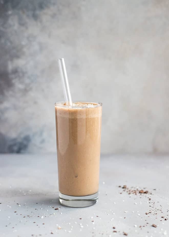 Coffee smoothie in a tall clear glass