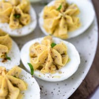 Hummus deviled eggs on a plate
