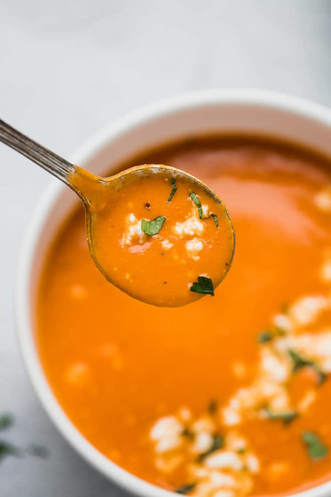 Tomato feta soup in a spoon
