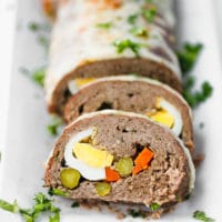 Low-Carb, Keto Stuffed Meatloaf Roll sliced on a plate