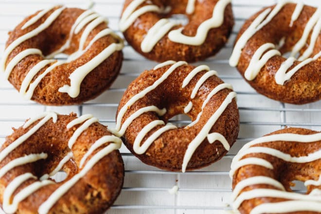 Low-carb apple donuts on a wire rack