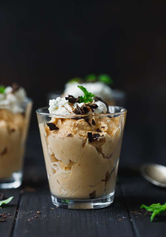 Sugar-free Ketogenic Pumpkin mousse in a glass topped with whipped cream