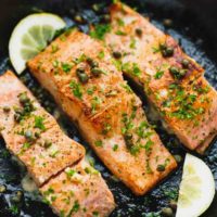 Salmon fillets in a cast iron skillet