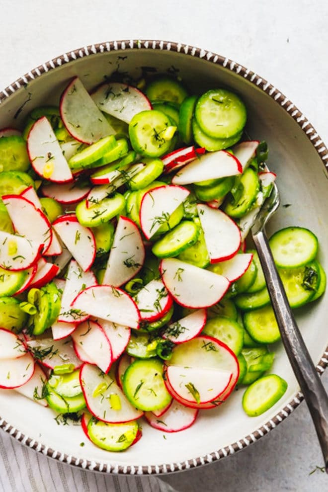 Cucumber radish salad in a bowl
