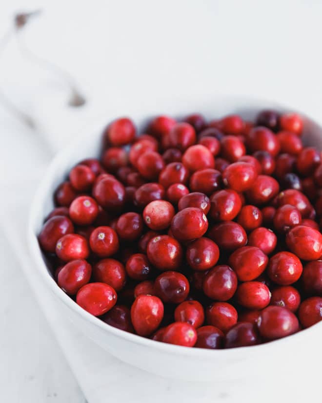 CRANBERRIES IN A WHITE BOWL