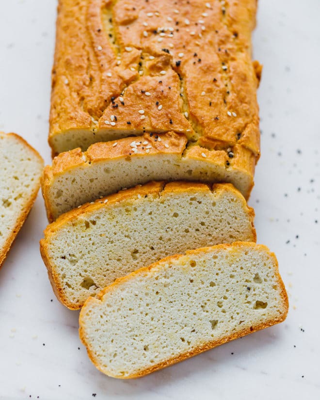 Keto Bread Loaf, sliced on a board