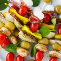 Colorful antipasto skewers on a plate