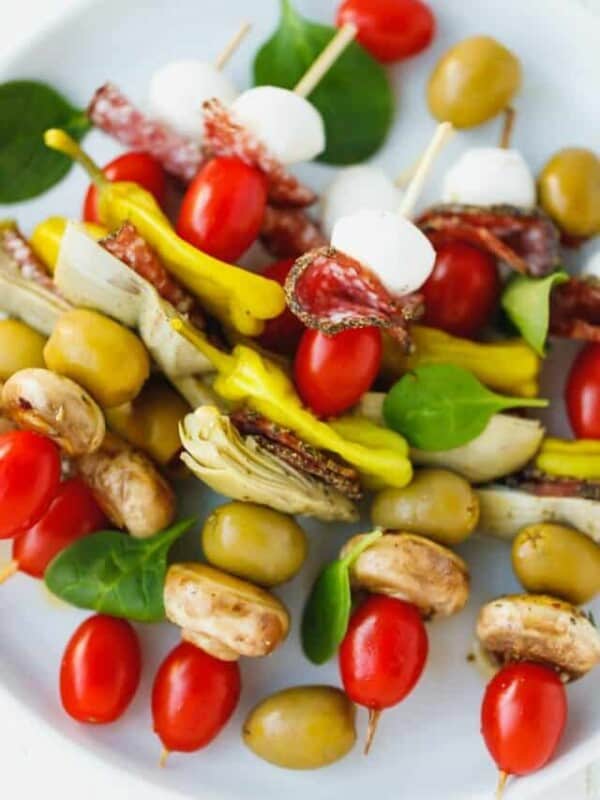 Colorful antipasto skewers on a plate