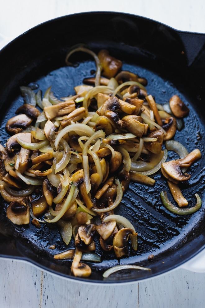 mushrooms and onions in a pan