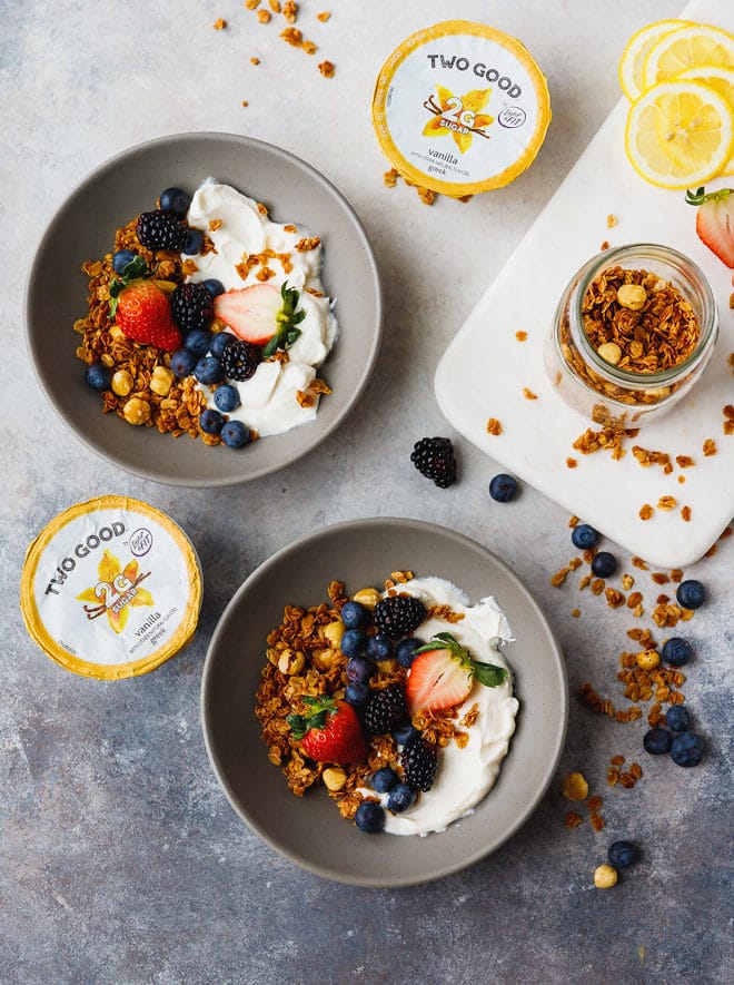 Granola with berries in bowls