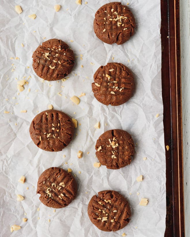 Keto chocolate peanut butter cookies on parchment paper