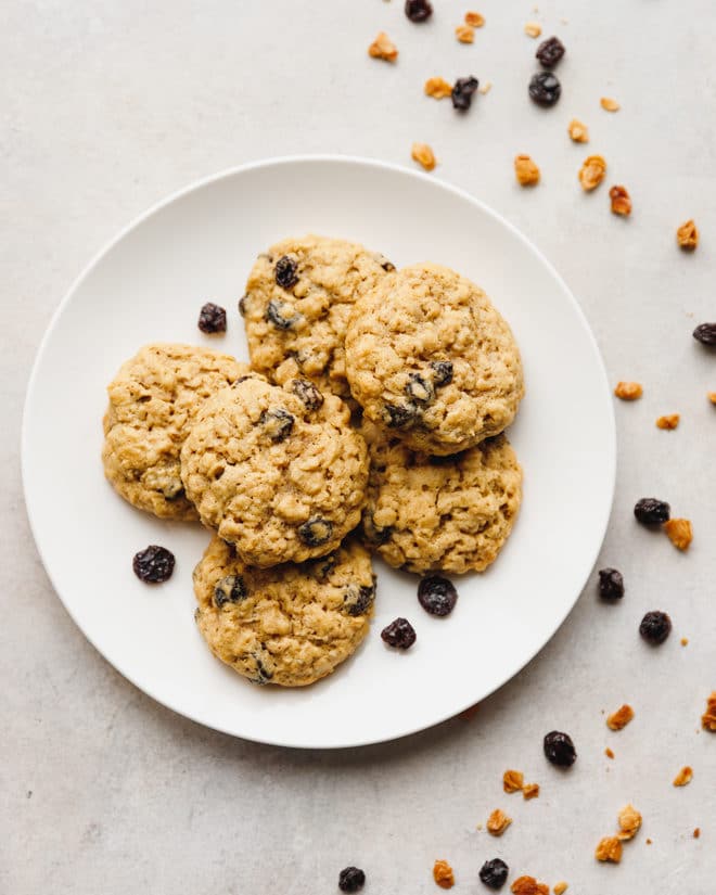 Chewy oatmeal raisin cookies on a white plate
