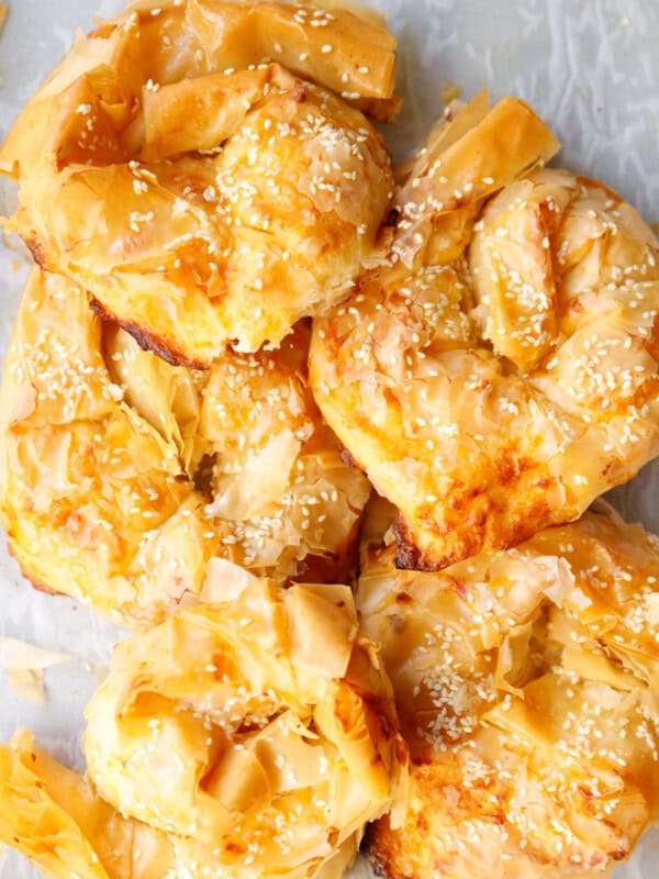 Crispy baked filo feta swirls - Bulgarian banitsa on parchment paper