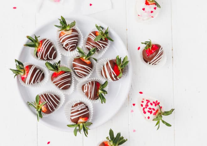 The Best Chocolate Dipped Strawberries on a plate
