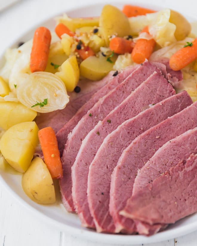Corned beef and cabbage on a white plate